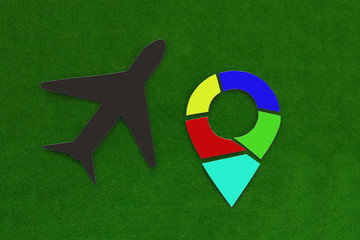 Fototapete - Airplane, navigation sign on a green background. Location, travel.