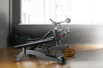 Sticker - Abdominal bench in gym. Modern sport equipment