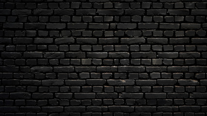 Wall Mural - texture of a perfect black brick wall as background or wallpaper