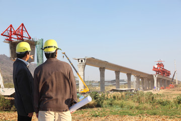 Wall Mural - Engineer on site, they are working at building construction area.