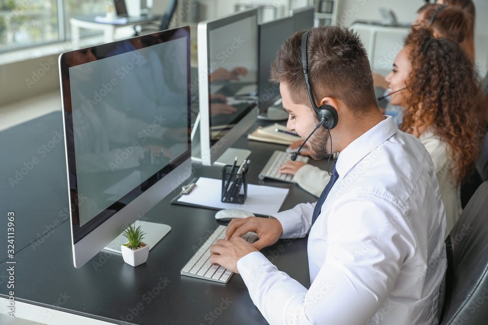 Technical support agents working in office