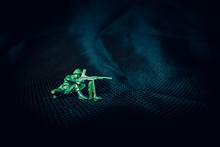 Green Plastic Army Man Ready For Combat
