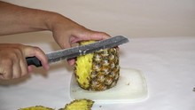 4k Pineapple Chopping. UHD Stock Footage