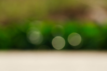 Abstract background of blurred white bokeh on a green background Bokeh that is smooth and absent-minded 