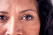 © Monkey Business - Close Up On Eyes Of Smiling Mature Woman In Studio