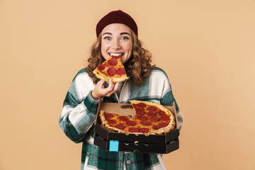 Canvas Print - Photo of pretty happy woman smiling and eating pizza at camera