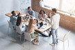 © Prostock-studio - Young leader speeking at morning briefing in modern office