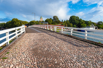 Wall Mural - Helsinki. Finland. The Fortress Of Suomenlinna. Bridge with white railings. The bridge leads to the fortress of Sveaborg. The Finnish fortress. Sights Of Helsinki. Historical monuments of Scandinavia