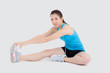 © NT_studio - Beautiful portrait young asian woman fitness with stretching leg isolated on white background, asia girl workout with full body exercise and warm up, body care and healthy concept.