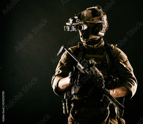 Fotografía Army elite soldier with hidden behind mask and glasses face, in full tactical am
