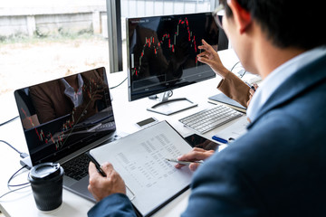 Poster - Business team investment working with computer, planning and analyzing graph stock market trading with stock chart data, business financial investment and technology concept
