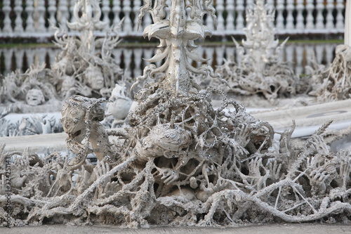 Fotomural Demons, fantasy creatures in Wat Rong Khun (White Temple) in Chiang Rai (Thailand)