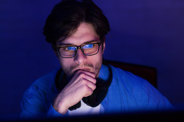 Aufkleber - Thoughtful Developer Looking At Computer Screen Working From Home, Low-Light