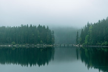 Moody Forest Reflections At Lake Eibsee During Blue Hour