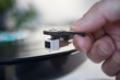 Close up of Vinyl record player needle on turntable
