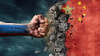 Fist breaking rock. Russia destroying China