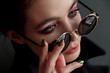 © Oleg Samoylov - Fashion portrait. close-up portrait of a beautiful young girl in black round sunglasses.Girl poses for the photographer.