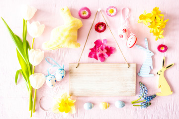 Wall Mural - Rustic Wooden Sign With Copy Space. Sunny Flat Lay With Spring Flower Blossoms And Easter Decoration Like Easter Bunny. Wooden Pink Background