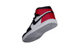 A high sneaker with red and black accents. Athletic boot.