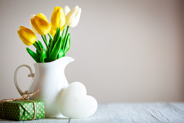 Wall Mural - greeting card with flowers and heart. background with copy space. selective focus.