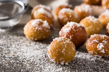 Carnival Fritters Or Buñuelos De Viento For Holy Week On Wooden Table	