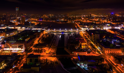 Wall Mural - Yekaterinburg aerial panoramic view at night. Ekaterinburg is the fourth largest city in Russia and the centre of Sverdlovsk Oblast located in Eurasian continent on the border of Europe and Asia.