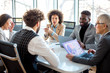 © Sanja - Businesspeople having a meeting in the conference room.