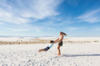 © Mint Images - teen girl swinging her 6 year old brother in sand, White Sands Nat'l Monument, NM,White Sands National Monument