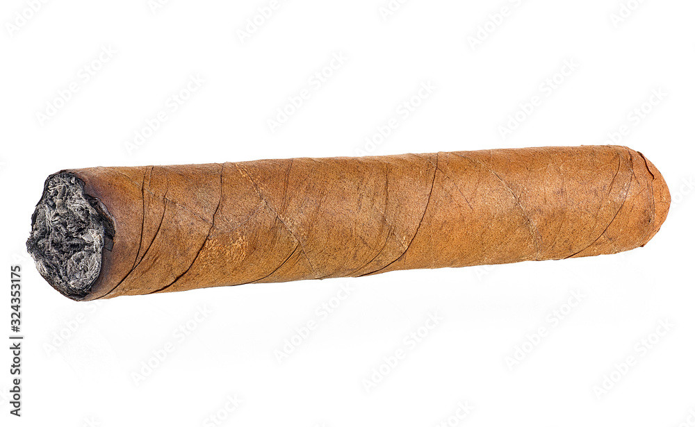 Big brown cigar isolated on a white background, side view. Hand rolled  cigar. Burned cigar. Stock Photo