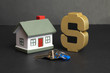 © John Mantell Photo - stress ball’s in the shape of a House and Dollar Sign great Illustration for buying or selling a house or how stressful that can be isolated on black ( ad copy space )  with Key Sold!