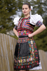 Beautiful slovak woman in traditional costume. Slovak folklore.