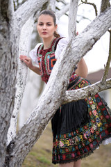 Beautiful slovak woman in traditional costume. Slovak folklore.