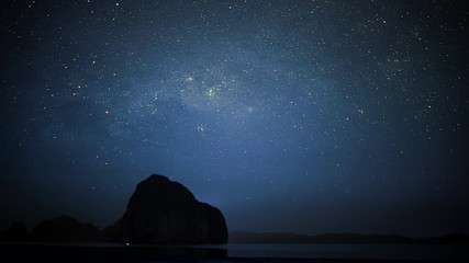 Wall Mural - Starry sky with shooting stars and silhouette of island in Palawan
