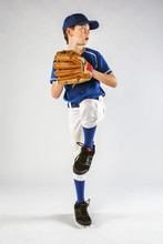 Young Baseball Player Preparing To Throw A Pitch