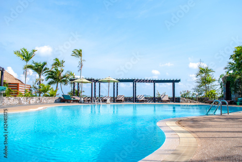 Cuadros en Lienzo landscape swimming pool blue sky with clouds