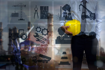 Double exposure of  Engineer or Safety officer holding hard hat and wheel grinding on steel structure  .