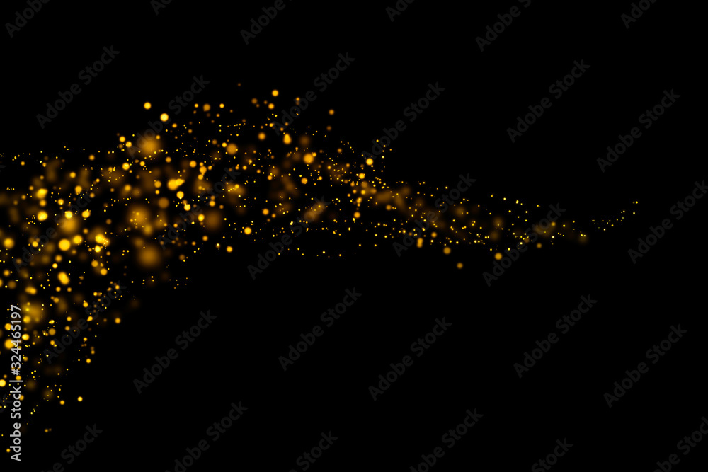 Golden light bokeh and abstract glittering on dark background ...