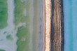 © Bob - aerial view of a gravel road and salt lake