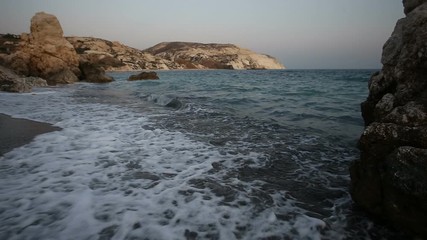 Wall Mural - Waves of the sea roll onto the shore of Aphrodite's beach