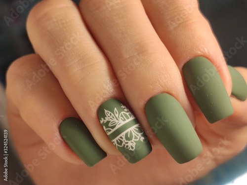 beautiful gel lacquer manicure on a textured background Fototapet