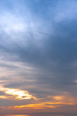 Wall Mural - sunset / sun rise sky with rays of yellow and red light shining clouds and sky background and textur