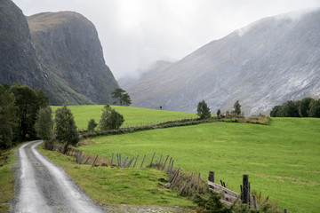 road leading to mountain scenery