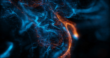 Poster - abstract macro shot of blue and orange particle fluid isolated on black. paint drops mixing in water