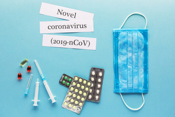 Coronavirus 2019 n-Cov concept. Medicines for Coronavirus and tablet on color background