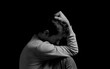 © Serhii  Holdin - black and white dramatic photo in a depressed pose