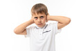 © Ivan Traimak - Young caucasian teenager doesn't want to hear on white background