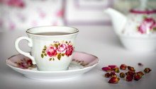 A Cup Of Tea With Dried Roses