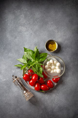 Wall Mural - Caprese salad ingredients - tomatoes, cheese and basil.