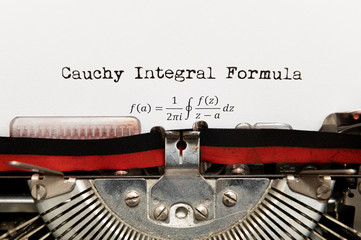 Poster - Cauchy math integral formula written on paper with typewriter
