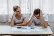 © Koto Amatsukami - Stressed caucacian couple conflict of credit card bills or debt of over expense in shopping. Lover financial risk or crisis and bad habits of shopaholic. Lack of money discipline, planning and advisor